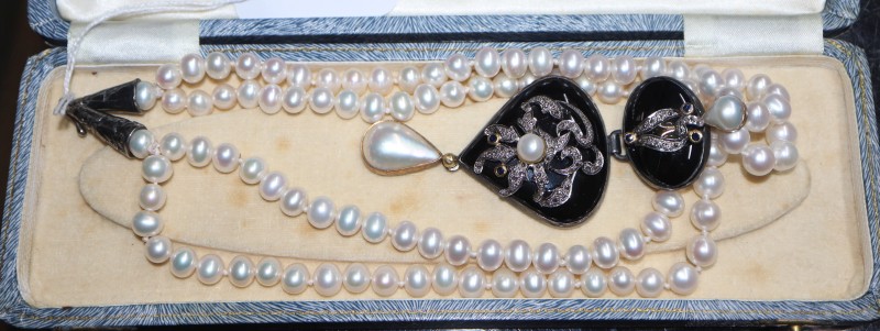 A modern silver, enamel, cultured pearl and rose cut diamond set drop pendant, on a twin strand cultured pearl necklace,